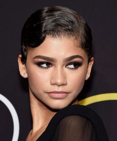 an image of a woman with short hair and smoky eyeshadow on the red carpet