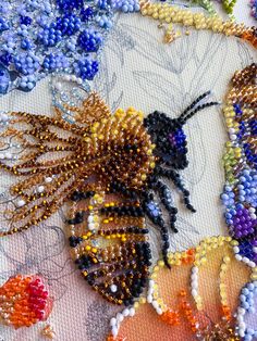 the beaded work is being worked on with beads