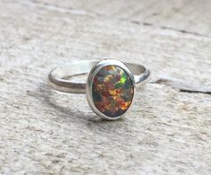 Fiery Multicolored Oval Mexican Opal Sterling Silver Ring | Opal Ring | Gifts for Her | October Birt Nickel Free Oval Opal Ring For Anniversary, Round Opal Ring With Natural Inclusions For Gift, Round Opal Ring With Natural Inclusions As Gift, Ethiopian Opal Oval Rings As Gifts, Adjustable Oval Opal Ring For Gifts, Oval Sterling Silver Opal Ring Gift, Artisan Oval Opal Ring In Sterling Silver, Handmade Oval Opal Ring In Sterling Silver, Artisan Sterling Silver Oval Opal Ring