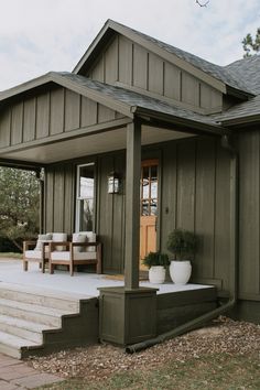 a house with steps leading to the front door