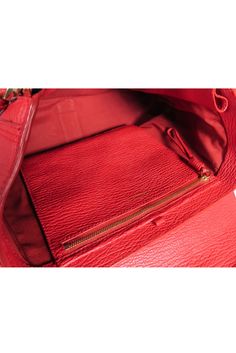 Unleash your inner fashionista with the 3.1 Phillip Lim red leather "Pashli" satchel bag. This structured handbag features bold red leather and gold hardware for a statement-making look. With its versatile crossbody strap, it's the perfect addition to any wardrobe in need of a pop of color. 100% Leather Gold lock front closure Two front zipper details One interior zipper pocket Detachable and adjustable long strap Comes with dustbag Minor scratches on front closure Height 10.5" Width 13" Depth 4 Philip Lim, Buy Shoes Online, 3.1 Phillip Lim, Luxury Shop, Satchel Bag, Zipper Detail, Phillip Lim, Free Giveaway, The 3