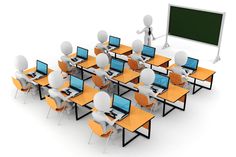 a group of people sitting at desks in front of computers