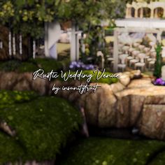 an artistic photo of moss growing on rocks and trees in a garden setting with the words rustic wedding venue by incentift