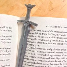 This Skyrim steel sword inspired bookmark would be a great gift for any book lover.    The multiple colour bookmark consists of three colours Bookmark Collection, Bookmarks Diy, Nerdy Gifts, Bookish Things, Dog Ear, Flowering Shrubs, Geek Gifts, Plant Roots, Elder Scrolls