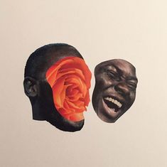 an image of two men with faces painted orange and one has a rose in his mouth