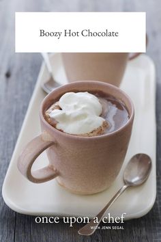 two cups of hot chocolate with whipped cream