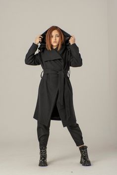 "Hoodie Wool Coat, Elegant Coat, Belted Women Coat ABOUT THE COAT: *Wool warm coat with pockets and soft lining. *The Hoodie is with buttons. You can wear the coat with Hoodie or You can remove the Hoodie. *It is very good in combination with leggings, trousers as well as a dress. *The coat is stylish, warm and comfortable. *The Coat is perfect for work, events and walks. *We offer the coat in different colors - Please check the colors and write to us. *It's a perfect for gift *COMPOSITION* Wool Hooded Pea Coat For Winter, Fall Outerwear With Adjustable Hood, Oversized Hooded Raincoat For Work, Oversized Outerwear With Double-lined Hood For Cold Weather, Long Sweater Coat With Pockets For Cold Weather, Hooded Wool Coat With Pockets For Winter, Winter Raincoat With Detachable Hood And Long Sleeves, Oversized Wool Coat With Pockets For Cold Weather, Winter Raincoat With Detachable Hood