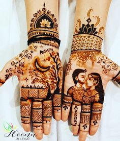 two hands with hendi designs on them, one is holding the other's hand