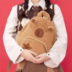 Carry a dash of capybara charm with our Small Capybara Plush Backpack – a delightful and functional accessory that brings a touch of whimsy to your daily adventures. This kawaii backpack isn't just for essentials; it's a celebration of the adorable capybara spirit and the joy they bring into your life. Transform your outings with the delightful charm of our Small Capybara Plush Backpack – where cuteness meets convenience in every carry. Size: 24x11x29CM Capybara Plush, Kawaii Backpack, Plush Backpack, Functional Accessories, Your Back, Carry On, Backpacks, Bring It On, Kawaii