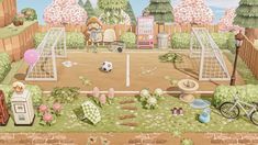 a game scene with a soccer goal and other items on the ground in front of a fence