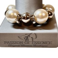 Pearl Bead Fashion Bracelet Makes A Statement By Itself. Have Fun With Fashion, Dress It Up With Some Jeans. However, It Can Also Be A Versatile Accessory That Can Be Easily Paired With A Variety Of Outfits. Whether You Want To Make A Statement Or Add A Touch Of Elegance To A Casual Outfit, This Pearl Bead Fashion Bracelet Is The Perfect Choice. It Can Be Dressed Up With A Little Black Dress Or Dressed Down With A Pair Of Jeans, Allowing You To Have Fun With Fashion And Express Your Personal Sty Silver Beaded Pearl Stretch Bracelet, Silver Pearl Stretch Bracelet, Elegant Metal Stretch Bracelet With Round Beads, Elegant Party Stretch Bracelet With Large Beads, Elegant Stretch Bracelet With Large Beads For Gift, Elegant Stretch Bracelet With Large Beads As Gift, Elegant Large Beads Bracelets For Party, White Metal Jewelry With Silver Beads, Elegant White Beaded Bracelets With Silver Beads