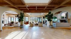 a large open living room with high ceilings