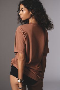 Hot off the press: laidback tees with gotta-have graphics. | Tennis Short-Sleeve Graphic T-Shirt by Back When in Red, Women's, Size: Smallmall, Cotton at Anthropologie Relaxed Soft-washed T-shirt With Shirttail Hem, Fall Relaxed Fit T-shirt With Shirttail Hem, Trendy Brown Relaxed Fit T-shirt, Everyday Soft-washed Brown Tops, Everyday Soft-washed Brown Top, Relaxed Short Sleeve T-shirt With Screen Print, Short Sleeve Tops For Streetwear In Fall, Basic Soft-washed Tops For Streetwear, Relaxed Soft-washed Short Sleeve Tops