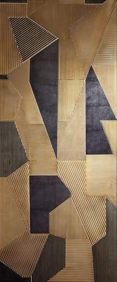 an abstract painting with gold and black lines on the wall, as if it were made out of wood