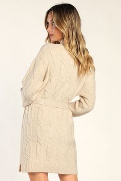 Bundling up for the season has never looked so fabulous thanks to the Lulus Warmed Up To You Cream Cable Knit Mock Neck Sweater Dress! Thick, cozy wool-blend cable knit shapes a mock neckline, long sleeves, and a relaxed bodice. The shift silhouette falls to a cute mini hem and features a tying belt that allows you to cinch the waist. Contrasting ribbed knit accents the neckline, cuffs, and hem. Fit: This garment fits true to size. Length: Mid-thigh. Size medium measures 32.5" from shoulder to h Fall Cable Knit Sweater Dress, Winter Cable Knit Sweater Dress, Cozy Cable Knit Sweater Dress For Spring, Beige Cable Knit Sweater Dress, Cozy Cream Sweater Dress For Fall, Cozy Cable Knit Sweater Dress For Fall, Cozy Cable Knit Sweater Dress For Winter, Cream Knitted Sweater Dress For Fall, Cozy Beige Cable Knit Sweater Dress