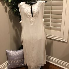 Truly Exceptional And Rare Bamford Silk Dress. Under Layer Is Silk Slip Dress. Over Layer Is Embroidered Silk, Ties On Side. Both Are Airy And Ethereal. Never Worn . Rare And Beautiful. Perfect For A Wedding , Rehearsal Or Maybe Even A Casual Beach Wedding. Elegant Embroidered Dress With Neckline Detail For Summer, Elegant Day Dresses With Embroidered Hem, Elegant Embroidered Floral Dress For Brunch, Elegant Summer Dress With Embroidered Neckline, Elegant Embroidered Floral Dress For Beach, Elegant Embroidered Dress For Brunch, Elegant Embroidered Dress With Floral Embroidery For Beach, Elegant Floral Embroidered Dress For Brunch, Elegant Beach Dress With Floral Embroidery