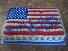 a birthday cake decorated with an american flag