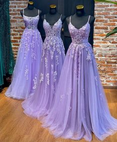 Lace A-line Gown With Sweep Train, Floor-length Lavender Tulle Dress, Purple Lace Dress For Debutante Ball, Purple Lace Floor-length Gown, Floor-length Tulle Dress With Lace Trim, A-line Tulle Maxi Dress For Prom Season, A-line Lace Prom Gown, Lace A-line Prom Gown, A-line Lace Gown For Prom Season