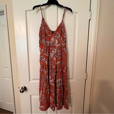 Long Floral Sundress Medium Burnt Orange With Cream Floral Print New With Tags, Never Worn V Neck With Adjustable Straps Very Cute Perfect For Spring Or Summer Orange Sundress Midi Dress For Vacation, Orange Printed Sundress For Vacation, Casual Orange Printed Midi Dress, Casual Orange Floral Print Maxi Dress, Orange Rayon Maxi Dress For Vacation, Orange Rayon Beach Dress, Orange Floral Print Midi Dress For Vacation, Orange Sleeveless Printed Midi Dress, Sleeveless Printed Orange Midi Dress