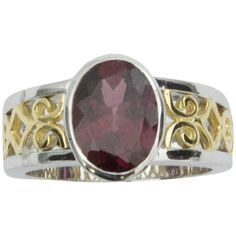 Beautiful Ring, centering an oval faceted 3.3 ct. Rubellite Tourmaline, 10mm x 8mm x 4.8mm; mounted in handmade 18K white and yellow gold lattice accented mounting; Ring size: 6.5. We offer complimentary ring re-sizing. Go from day to evening effortlessly! Rubellite Tourmaline, Gold Statement Ring, Tourmaline Ring, 3 Carat, Beautiful Ring, Antique Rings, Vintage Engagement Rings, Solitaire Ring, Statement Ring