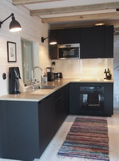 the kitchen is clean and ready for us to use in its new owner's home