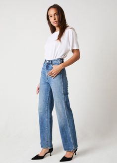 This is a high-rise, wide leg jean, made with a low stretch denim. Fits true to size. The Heidi: Tight around the seat but will soften with wear Features our signature back pocket stitching Specially angled and shaped in the back for a truly peachy looking butt Low stretch denim for a vintage look with the comfort of a stretch Zip closure Made with Rolla's vintage gold hardware The Measurement: Rise: 31 cm / 12 inch Inleg: 83 cm / 32 inch Hem: 49cm / 195 inch *Measurements for size 8 The Wash: S Denim Fits, Pocket Stitching, Nice Jeans, Romper And Jacket, Sneaker Dress Shoes, Sweater Tank Top, Classic Jeans, Denim Branding, Best Jeans