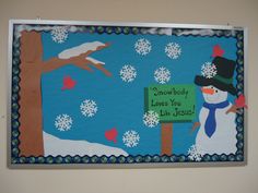 a bulletin board with a snowman holding a sign that says snow body loves you like jesus