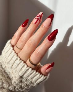 If you're craving elegant Christmas nail designs, you've come to the right place. Scroll through 50 different festive and stylish nail looks here. Trendy Nails Ideas Christmas, Christmas Round Nails, Holiday Nails Inspiration, Trendy Christmas Nails 2023, Christmas Nails Round, Noel Nail Art, Christmas Eve Nails, Red Chrome Christmas Nails, Christmas Nail Designs Red