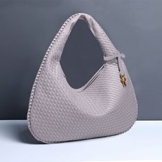 The Veltique Pantherique Tote is crafted from durable PU material with a woven pattern, featuring a secure zipper closure and a polyester lining for added durability. Elegant Crocodile Pattern Shoulder Bag For Shopping, Elegant Purple Bag With Zipper Closure, Elegant Silver Shoulder Bag With Crocodile Pattern, Elegant Silver Crocodile Pattern Shoulder Bag, Purple Rectangular Shoulder Bag With Gold-tone Hardware, Sophisticated Casual, Alligator Pattern, Casual Tote Bag, Pu Leather Bag