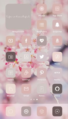 an iphone screen with pink flowers and other things on the phone's display area