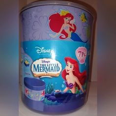 the little mermaid plastic container is on display