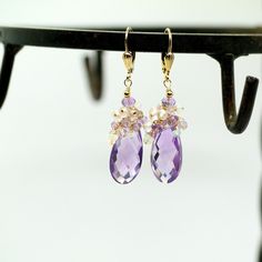 "Pink Amethyst, Rose Quartz and Ethiopian Opal Gemstone Earrings in Gold Filled. Stunning large Pink Amethyst briolettes, wrapped with high quality 14k gold filled wire, suspended from a cluster of shimmering Opal, Pink Amethyst and Rose Quartz beads. These are the best quality Pink Amethyst gems I have seen, transparent with a warm and uniform color - really unique and one of a kind! Light, dangly, shimmering feminine, chic statement earrings, perfect for special occasion, wedding, holidays or Fine Jewelry Amethyst Earrings With Gemstone Accents, Elegant Lavender Earrings With Ear Wire, Briolette Earrings With Gemstone Accents For Anniversary, Briolette Gemstone Earrings For Wedding, Elegant Amethyst Earrings With Natural Stones, Elegant Lavender Earrings With Gemstone Accents, Fine Jewelry Faceted Wedding Earrings, Amethyst Earrings With Gemstone Accents For Wedding, Amethyst Gemstone Earrings For Wedding