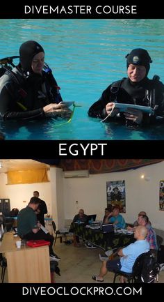 two people in scuba gear sitting next to each other and one person holding a tablet