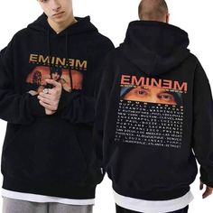 a man wearing a black hoodie with an emi emi emi emi emi emi emi emi emi