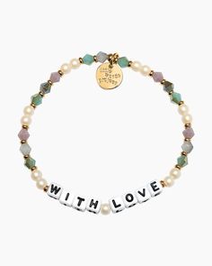 Add a pop of style and sentiment to your wrist with this stunning Little Words Project bracelet! Its eye-catching design and message spelled out in letter beads make it a great choice for your bracelet stack. Letter beads spell out "WITH LOVE" S/M size elastic stretch bracelet Hand-crafted beaded bracelet Plated brass hardware Handle with care - do not wet Due to the one-of-a-kind nature of the medium, exact colors and patterns may vary slightly from the image shown Little Words Project, Erin Gray, Love S, Trendy Bracelets, Love Bracelet, Letter Beads, Sneaker Heels, Love Bracelets, Bracelet Stack