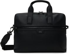 Buffed faux-leather briefcase in black. · Grained faux-leather trim throughout · Twin carry handles · Adjustable and detachable logo-woven crossbody strap · Logo hardware at face · Zip pocket · Logo-woven luggage strap at back face · Two-way zip closure · Laptop compartment at interior · Zip pocket and patch pockets · Logo-woven twill lining · Logo-engraved gunmetal-tone hardware · H11 x W15 x D3 Supplier color: Black Modern Black Briefcase With Leather Trim, Black Leather Trim Briefcase, Black Leather Trim Briefcase For Work, Black Briefcase With Leather Trim For Work, Black Leather Trim Briefcase For Business, Black Leather-trimmed Briefcase For Business, Business Briefcase With Leather Trim In Black, Modern Black Briefcase With Leather Handles, Black Satchel With Leather Trim For Work