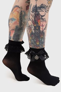 HEXTRA. Let's get spooky! - Opaque + Stretch.- Accent Ruffle-Trim.- Satin Bow + Pentagram Charm.- Short Length.- One Size: Size Range UK5 - UK10. Wanna make yer footwear stand out even more? Or simply add a dash of romance to each and every step? The 'Hextra' ankle socks are sure to please, silky smooth opaque body with just the right amount of stretch and complimentary ruffle trim, satin bow and pentagram charm. Total must-have; purrfect for high heels! Wash Cold - Gentle Cycle. with KILLSTAR B Dark Sister, Satin Bow, Ankle Socks, The Beast, Featuring Dress, Ruffle Trim, High Heels, Tights, Stockings