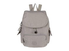 Kipling City Pack Small Backpack - Backpack Bags : Grey Gris : The Kipling City Pack Mini is the perfect sized bag for minimal travel or storage. Its multi-pocketed design creates more storage inside and out! Multi-pocket construction features one exterior zip pocket and one internal. Magnetic snap button and zip closure. Exterior features two snap button pockets and one drawstring pocket. Adjustable shoulder straps for a custom fit. Constructed of 100% polyamide with a polyester lining. Importe Daily Use Backpack With Pockets And Flap, Daily Use Flap Backpack With Pockets, Daily Use Backpack With Flap And Pockets, Gray Travel Bags With Functional Pockets, Multifunctional Travel Backpack With Pockets, Gray Travel Backpack With Pockets, Gray Travel Backpack With Zipper Pocket, Functional Gray Backpack With Zipper Pocket, Outdoor Gray Backpack With Zipper Closure