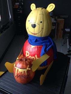 a winnie the pooh pumpkin sitting on top of a table