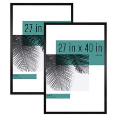 two black and white frames with palm leaves on them, one has the number twenty in it