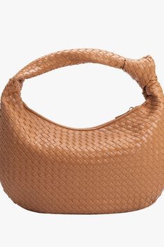 The Brigitte is a fine example of our attention to detail and quality. Its intricate basket woven handmade design and buttery soft feel add a touch of luxury to this understated hobo bag. The slouchy shape allows it to fit perfectly under your arm. Features interior zip and slot pockets. Luxury Vegan Leather 16"W x 10"H Handle Drop: 4" Zipper Closure Gold-Tone Hardware Interior Zip & Slot Pockets Signature Polka Dot Lining Fits up to an iPad Mini Elegant Brown Hobo Bag With Woven Leather, Brown Hobo Bag With Round Handle For Shopping, Chic Woven Leather Bucket Hobo Bag, Beige Woven Leather Hobo Bag With Top Handle, Brown Bucket Bag With Braided Round Handles, Chic Brown Shoulder Bag With Interwoven Design, Brown Bucket Bag With Braided Handles, Chic Light Brown Tote Hobo Bag, Chic Light Brown Hobo Tote Bag