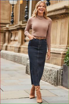 Give your jeans a day off, crafted from our signature soft stretch denim, cut to a trending midi silhouette, finished with a cool raw hem, wear with everything from nice tops to cosy knits, trainers heels boots - it's so versatile. Model is 5ft9in and wears a UK size 8. Machine washable. 78% Polyester, 16% Viscose, 6% Elastane. Camel Skirts, Flattering Outfits, Swimwear Dress, Heels Boots, Crew Neck Jumper, Denim Midi Skirt, Workwear Dress, Knit Jumper, Knitwear Women