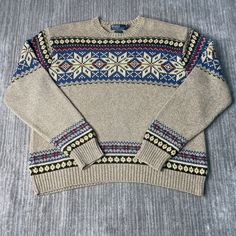 Vintage 90s Polo Ralph Lauren Snowflake Pattern Stitched Logo 1990s Fashion Grandpa Style Brown Knit Sweater Double Extra Large Mens  Condition:  Excellent Used Condition  = No Flaws Measurements: Please see photos above for all measurements IF YOU BUY TWO OR MORE ITEMS USE THE CODE BUNDLE @ CHECK TO SAVE 20% WE SHIP WITHIN 24 HOURS AFTER PURCHASE! Please be aware that we do not offer free returns!! The Buyer is responsible for the cost of the return label.  Follow us on TikTok & Instagram @findsnostalgic and tag us in your finds Casual Wool Sweater With Fair Isle Pattern, Vintage Crew Neck Outerwear For Winter, Classic Fair Isle Sweater For Winter, Classic Winter Sweater With Fair Isle Pattern, Vintage Knit Outerwear With Crew Neck, Vintage Crew Neck Polo Sweater For Winter, Vintage Knit Polo Sweater For Winter, Vintage Long Sleeve Polo Sweater For Winter, Knit Crew Neck Outerwear With Fair Isle Pattern