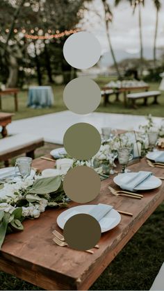 the table is set with plates and place settings for an outdoor dinner party or celebration