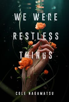 a hand holding flowers with the words we were restless things above it and under water