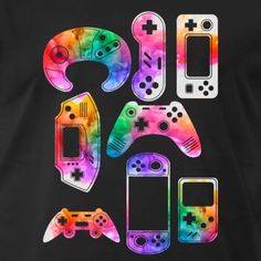 some colorful video game controllers on a black t - shirt