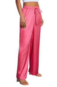 Lustrous, vibrantly hued satin brings bedroom vibes to these wide-leg drawstring pants that are an effortless work-to-weekend choice. Elastic/drawstring waist Side-seam pockets 100% polyester Hand wash, dry flat Imported Casual Satin Pants For Spring, Satin Loungewear Pants For Spring, Satin Pants For Spring Loungewear, Spring Satin Bottoms With Elastic Waistband, Summer Satin Straight Leg Bottoms, Casual Satin Loungewear Bottoms, Casual Satin Bottoms For Loungewear, Casual Satin Wide-leg Pants, Casual Satin Wide Leg Pants For Summer