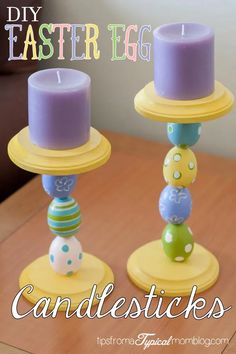 two candles sitting on top of each other with the words diy easter egg candlesticks