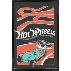 a framed poster with an image of a car on the road and words hot wheels