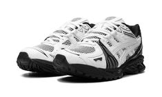 The GmbH x ASICS GEL-Kayano Legacy "White/Black" is a collaboration by the Berlin-based fashion brand and the Japanese sportswear company on an eye-grabbing colorway of the hybrid sneaker.  The ASICS GEL-Kayano Legacy fuses elements of many designs in the GEL-Kayano lineup, including using the ultra popular GEL-Kayano 14 as the base of the shoe.  Here, GmbH gives the silhouette a can’t-miss makeover.  The shoe features a black and white mesh base.  White overlays are seen throughout the design while a shiny black material is found on the heel and contrasting midfoot panel.  “Gel-Kayano Legacy” branding appears on the lateral heel.  Release date: September 21, 2023 Legacy Branding, Japanese Sportswear, White Black Shoes, Black Asics, White Overlay, Asics Gel Kayano, Gel Kayano, Stadium Goods, September 21